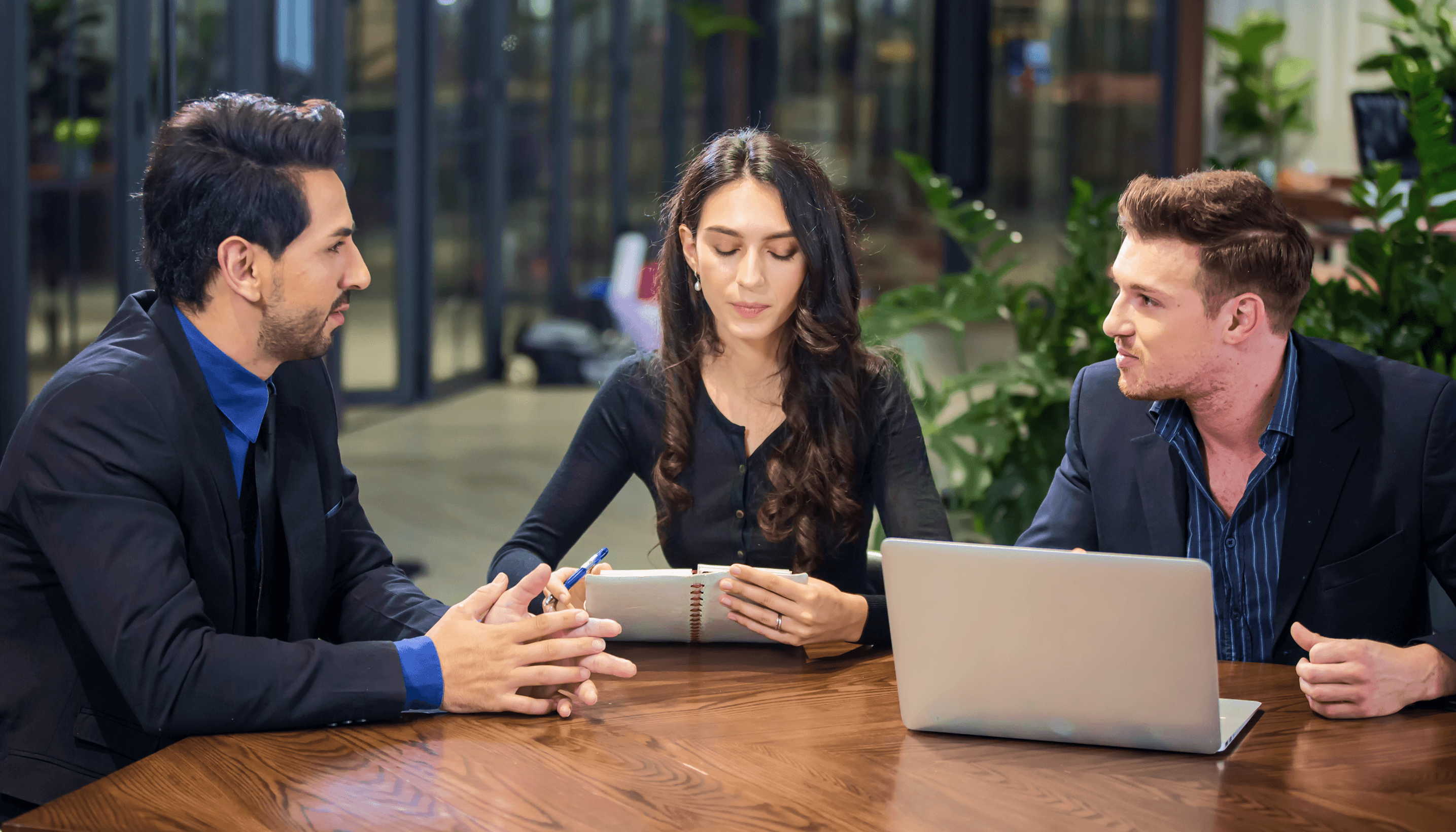 business-people-talking-office-using-digital-tablet-computer 1.png
